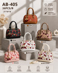 Cartera Coach estilo baúl