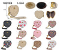 Cartera corazón Coach
